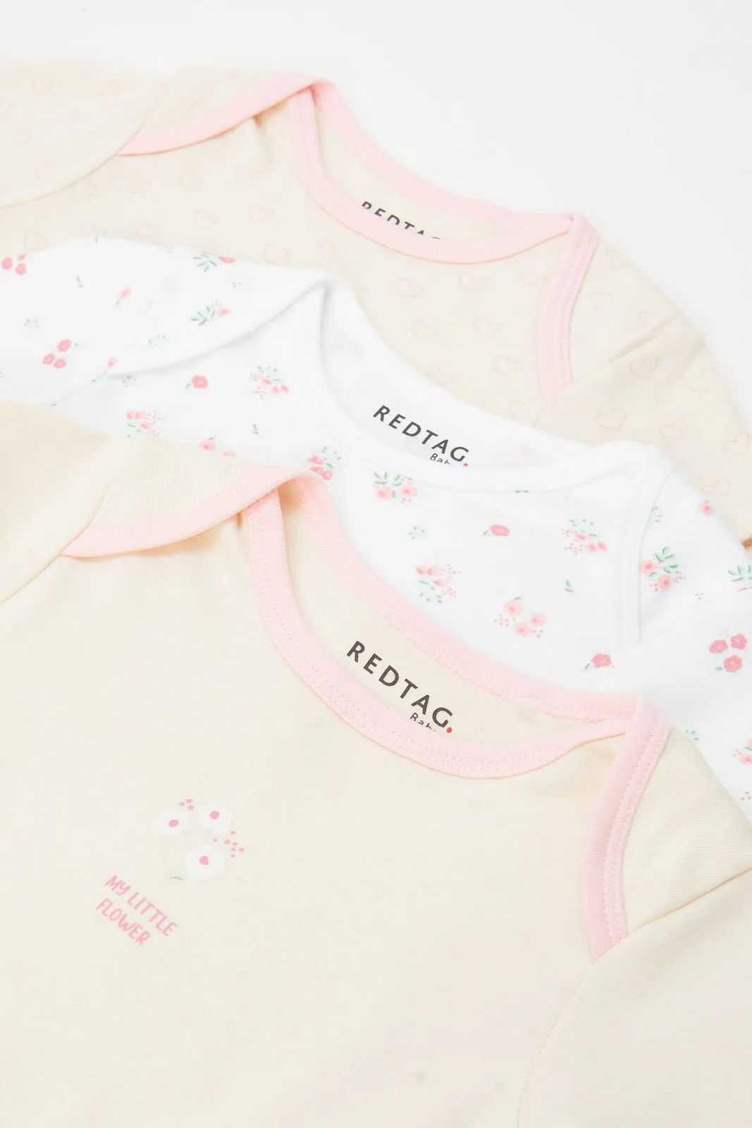 Baby Cream And Pink Printed Bodysuit Set (Pack Of 3)