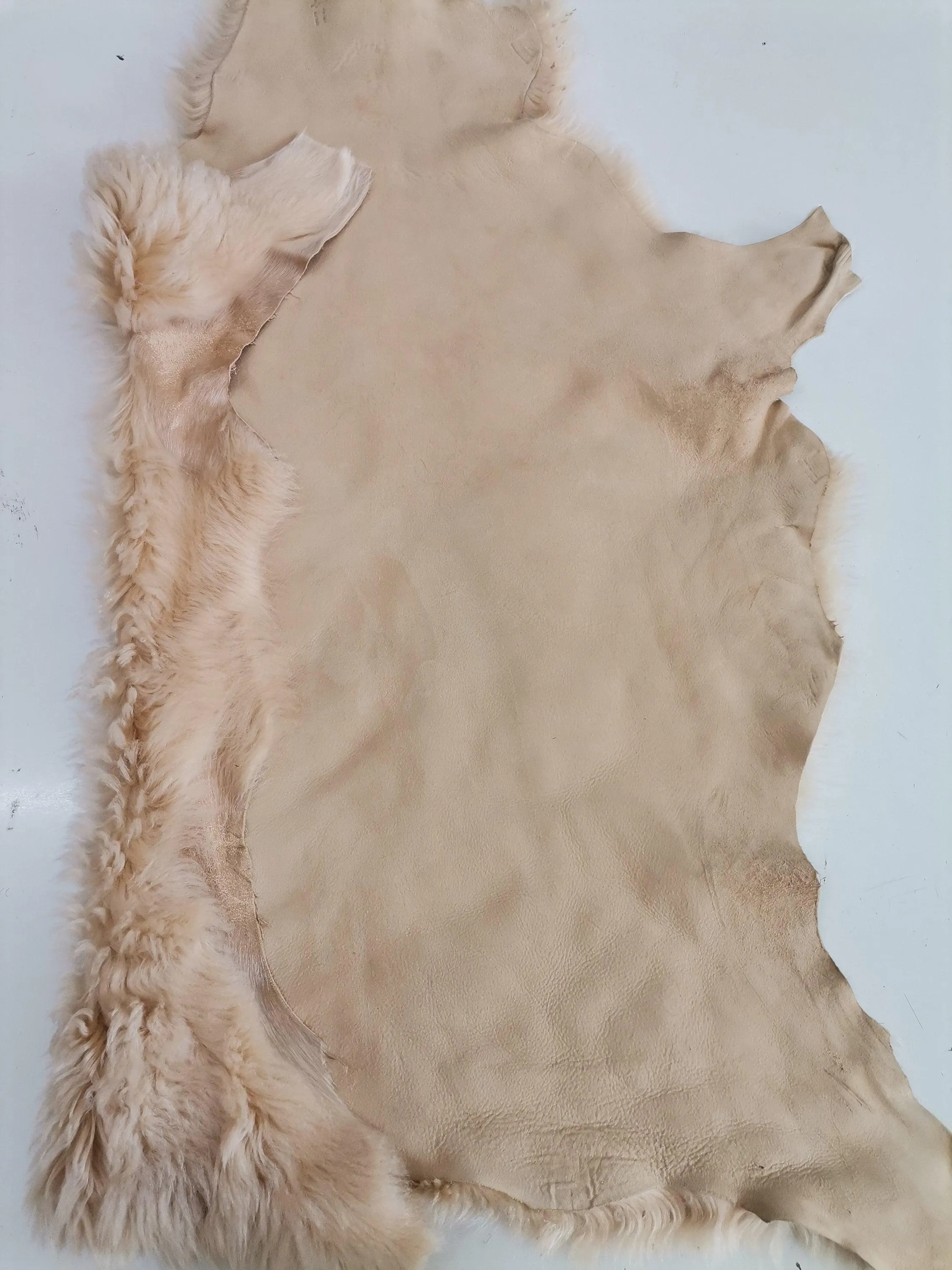 Sheepskin rug shearling leather hide, lambskin curly hair on, natural wool mouton leather